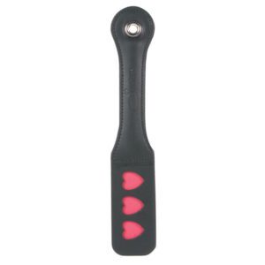 Black spatula with three red heart shapes on the blade.