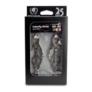 Pack of 25 black and white instantly shrinkable plastic charms with various designs.
