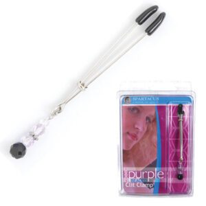 Personal grooming tool with interchangeable heads and a pink-themed packaging.