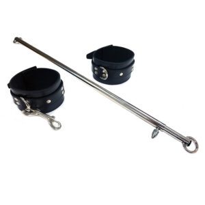 Black wrist and ankle restraints with a metal rod.
