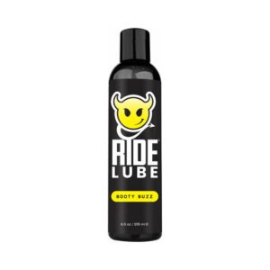 A black bottle of Ride Lube with a yellow smiley face logo.