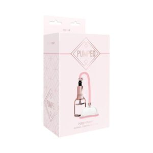 Pink box packaging for a beauty or grooming product with a logo and illustration.