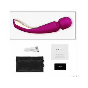 A purple personal massager with accessories and packaging.