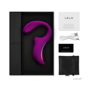 Purple dual-stimulation vibrator with accessories in a black box.