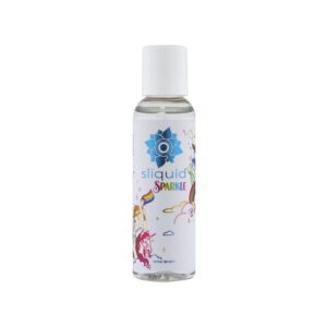 A clear bottle of perfume with floral design on the label.