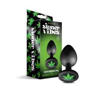 Black silicone butt plug with a green cannabis leaf design and packaging.
