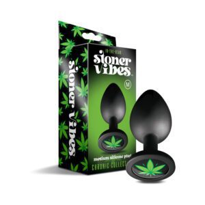 Black silicone butt plug with cannabis leaf design on base.