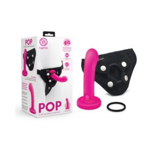Pink silicone adult toy with black harness and packaging.